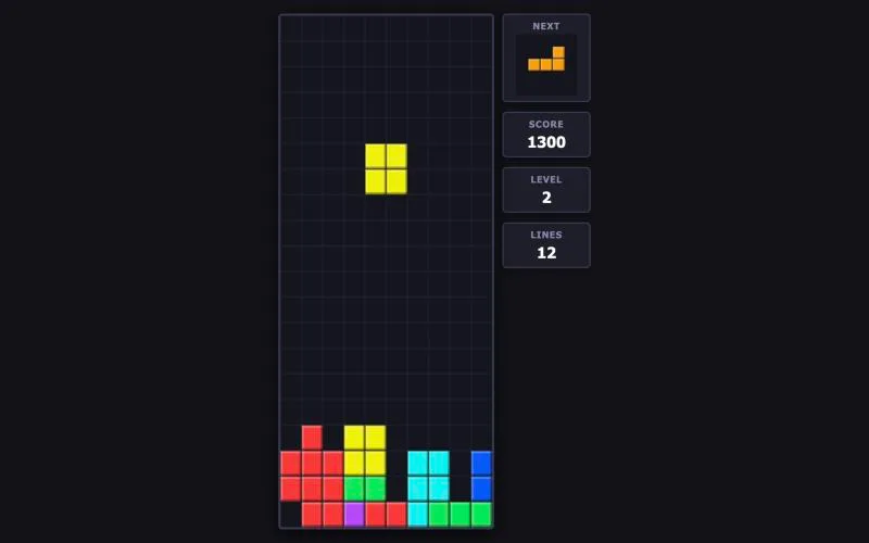 ブラウザで動く落ちものパズルのPC画面。得点1,300、レベル2、消した行数12が表示されている